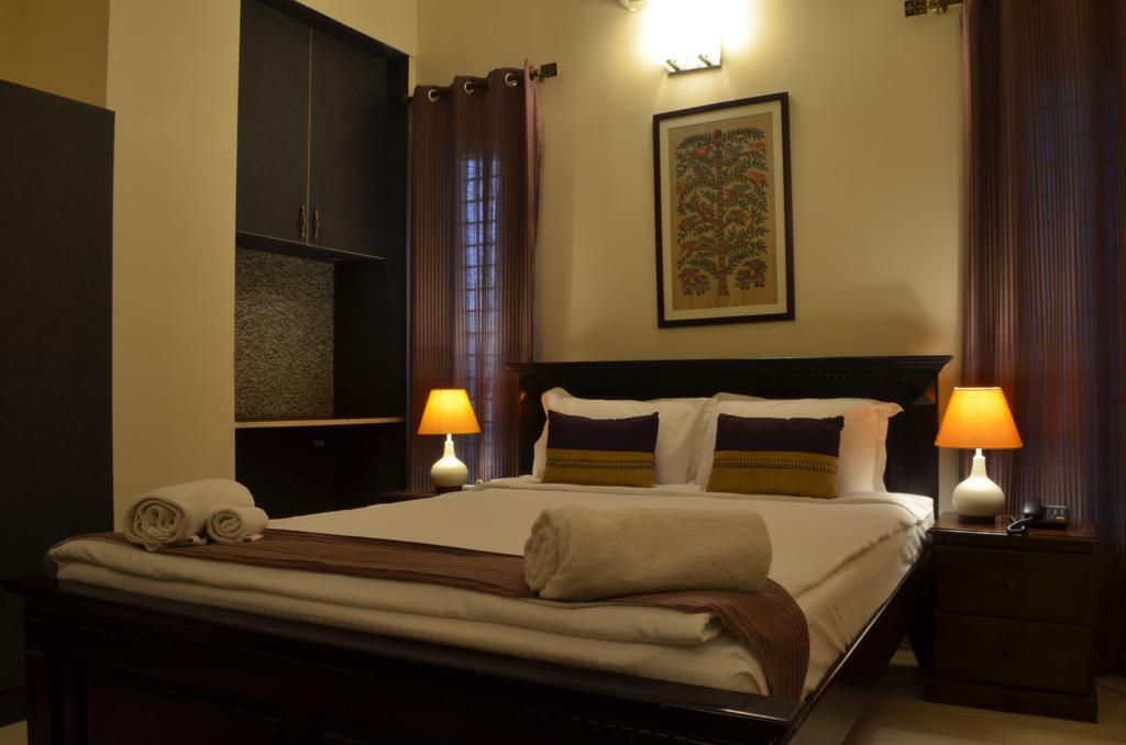 Luxtay Suites Bangalore Camera foto