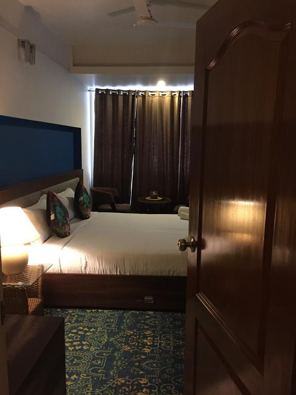 Luxtay Suites Bangalore Camera foto
